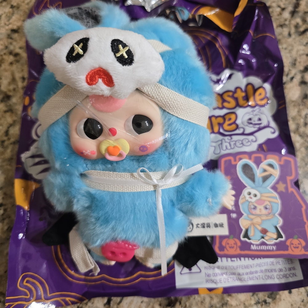 Blue Plush Toy with Mummy Costume